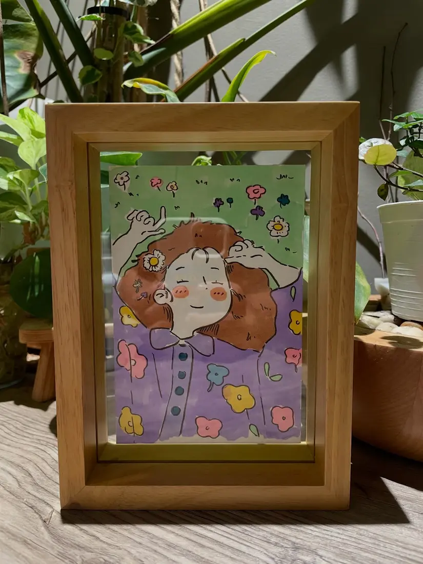 ภาพวาดสีต้นฉบับจริงจัดแสดงในกรอบไม้